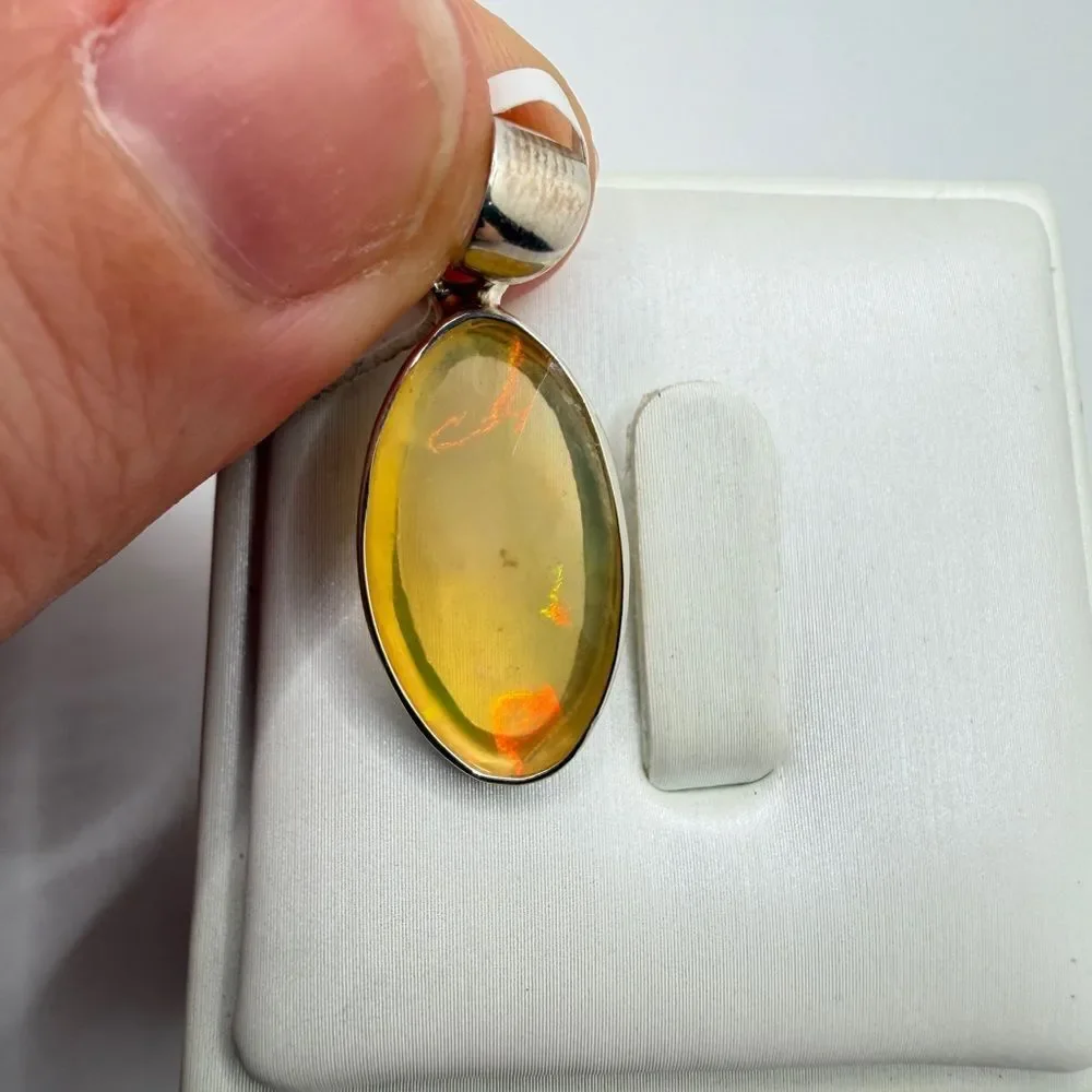 NWT‎ 12x22mm faceted oval cut OPAL pendant in sterling silver!